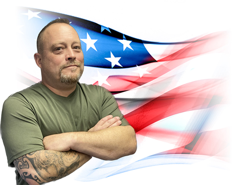 Nicholas Doe with an American Flag backdrop.